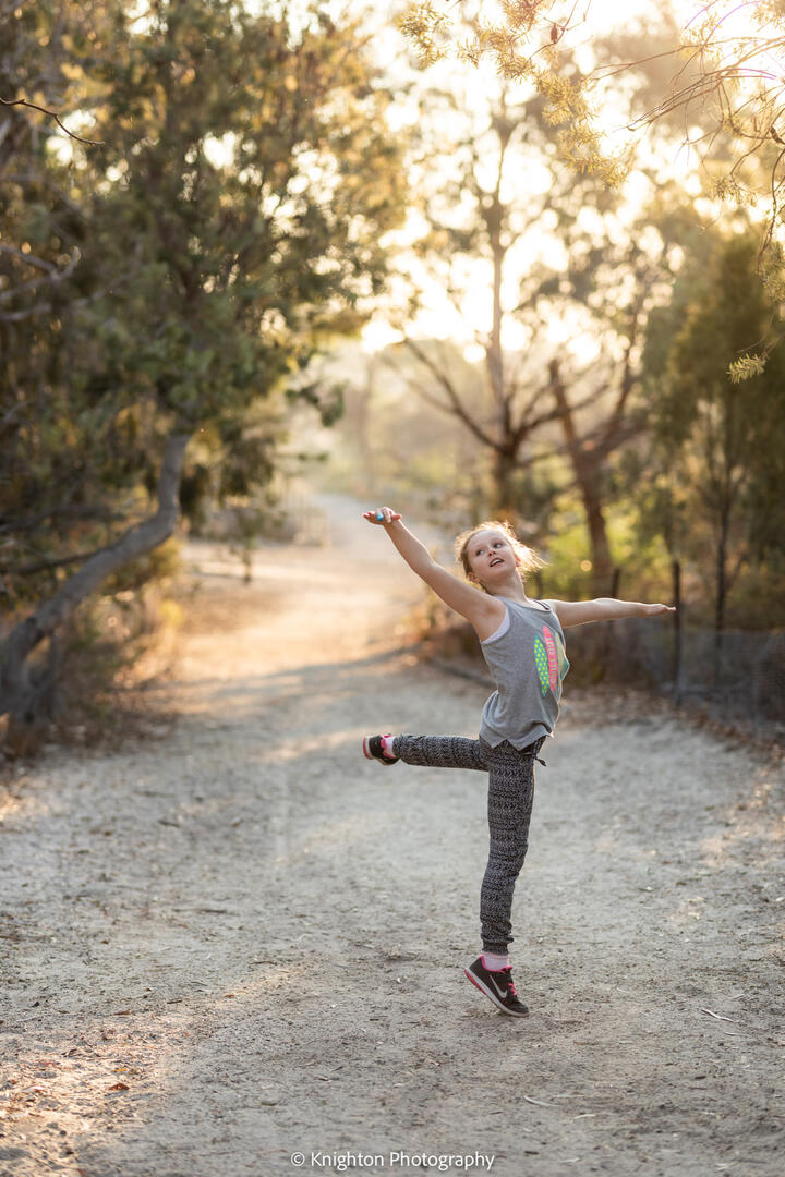 Dancing girl at golden hour