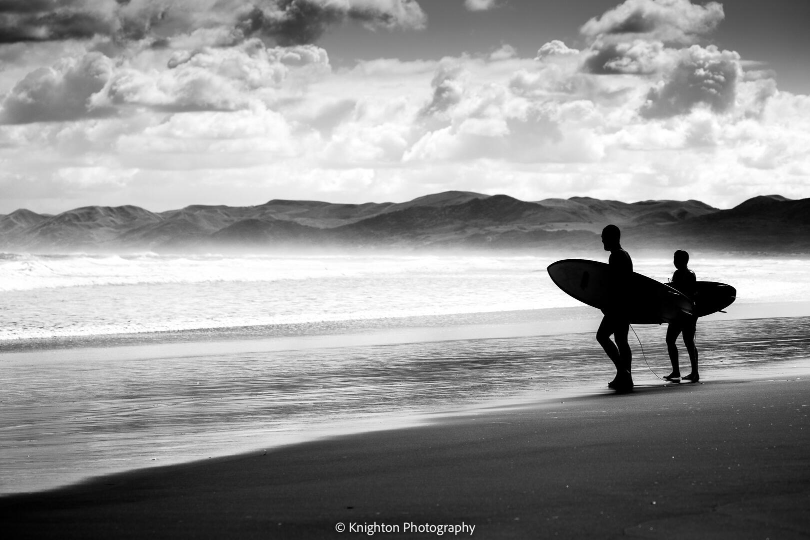 Surfers at Raglan NZ Surfers at Raglan NZ
