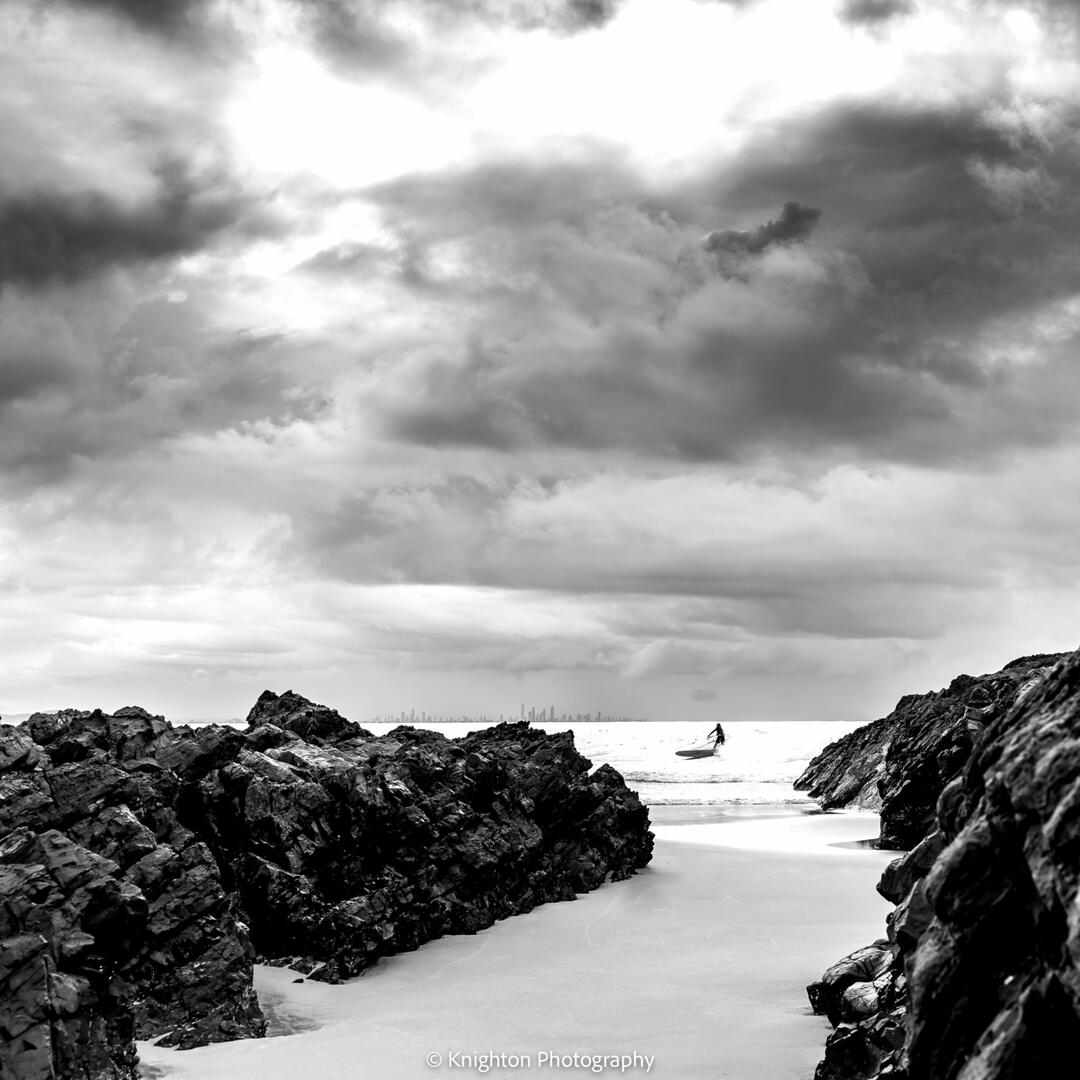 Surfer at Rainbow beach, Queensland